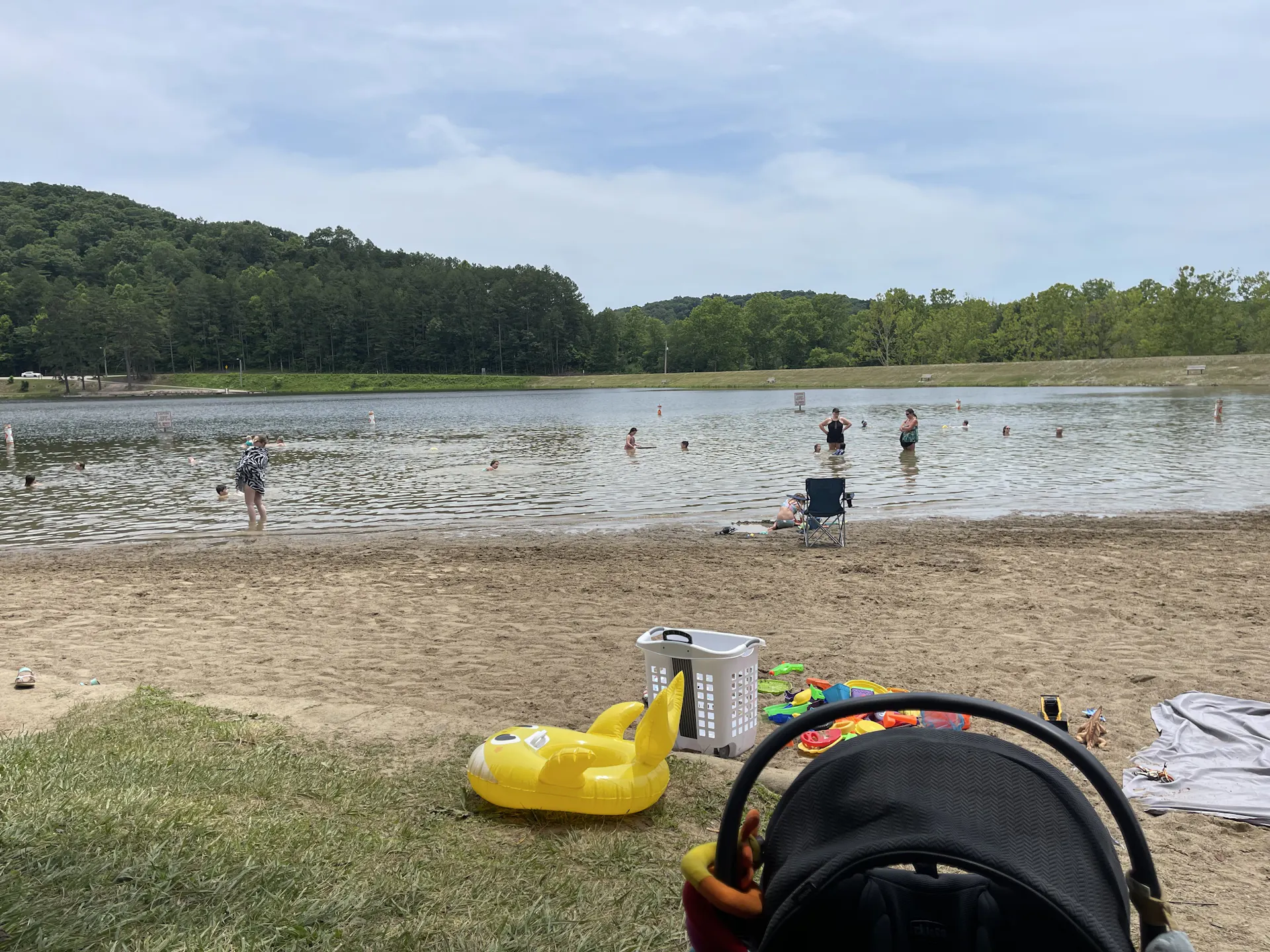 People play in a lake that has shrunk