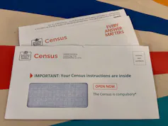 A census envelope with a letter poking out the top