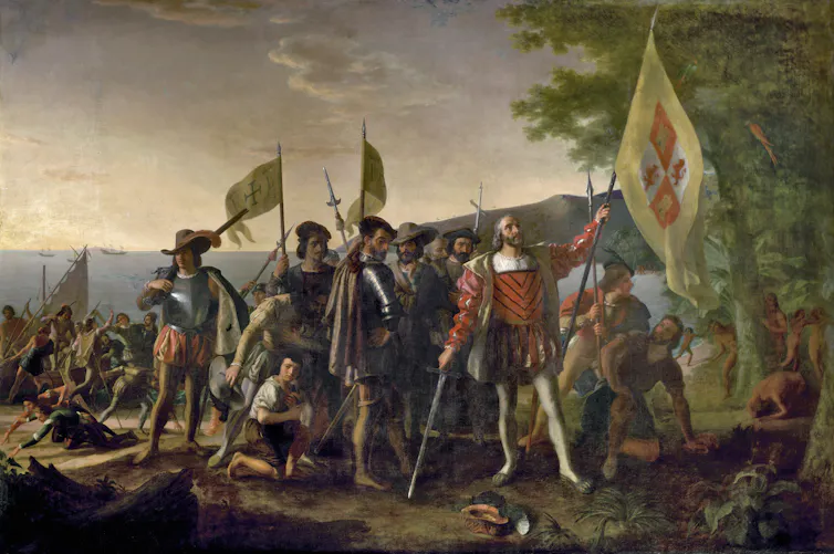 christopher Columbus is depicted landing in on an island with his men