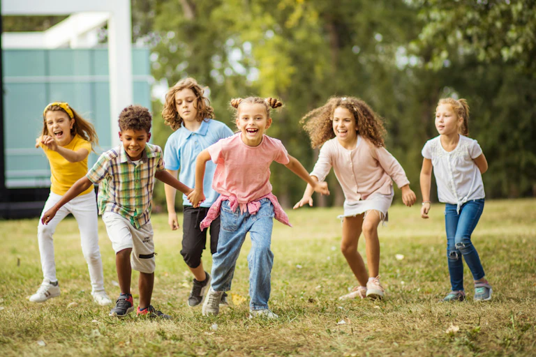 Children running on grass