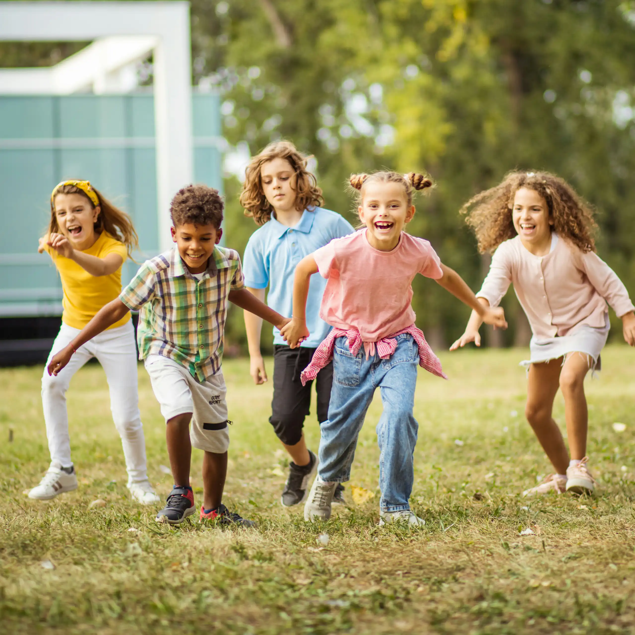 Children running on grass