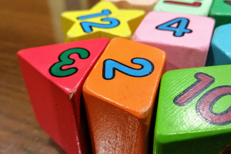Colourful blocks in different shapes with different numbers.