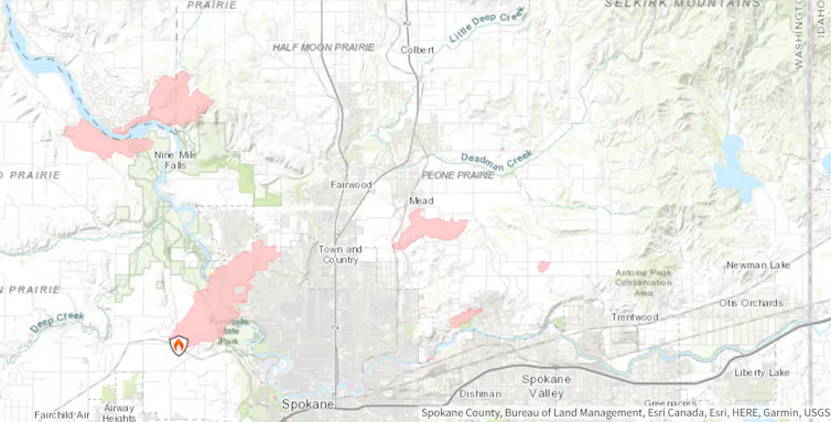 A map shows fires burning in neighborhoods near Spokane.