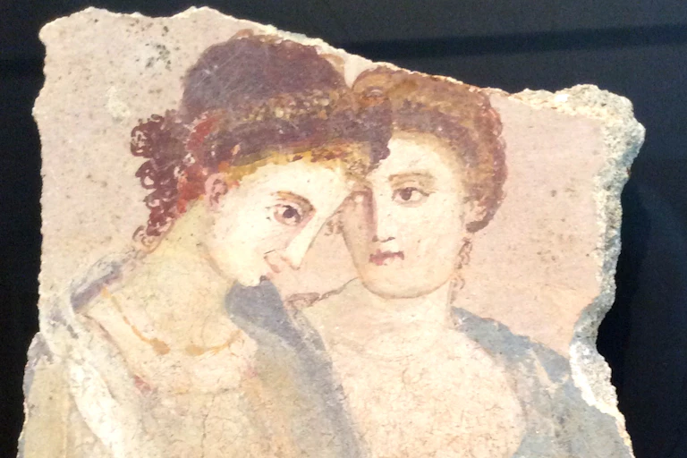 Wall fragment from a fresco with two Roman women.