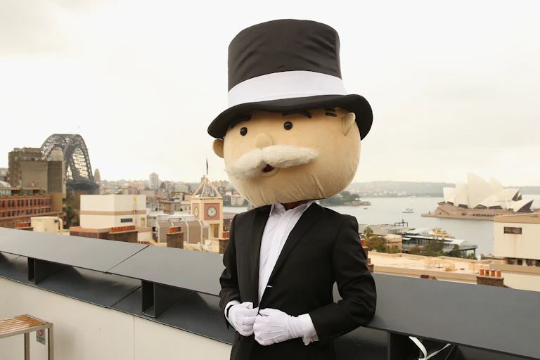The Monopoly man poses against the Sydney Harbour backdrop
