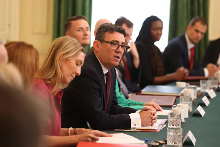 Prime Minister Andy Burnham holding his first cabinet meeting.