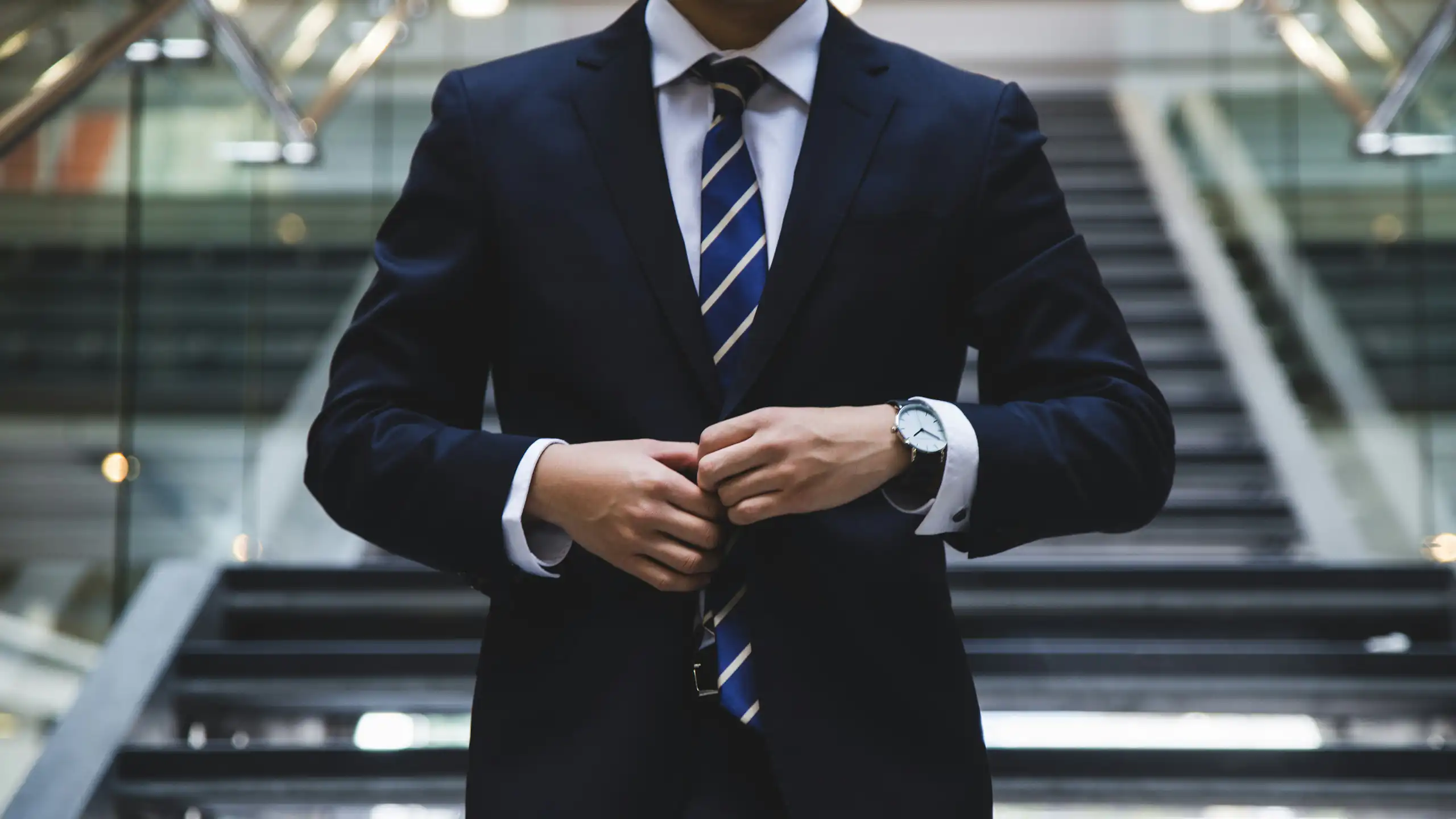 headless man in suit and tie