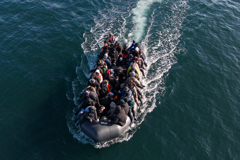 Migrants crossing the Channel on a small boat