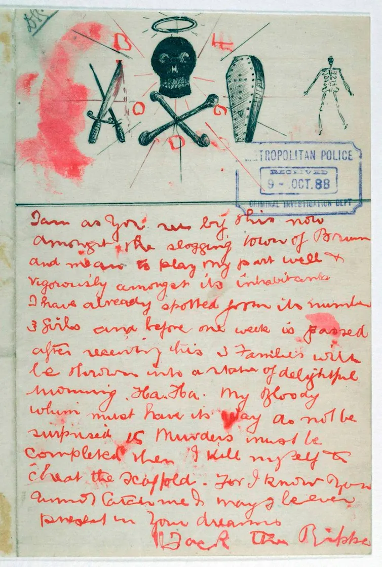 lettre manuscrite écrite à l'encre rouge avec dessins.
