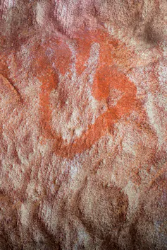 Hand stencil in Maltravieso cave