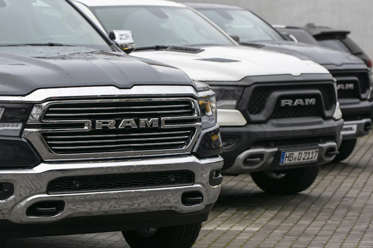 RAM pick-up trucks are seen at a public parking lot.