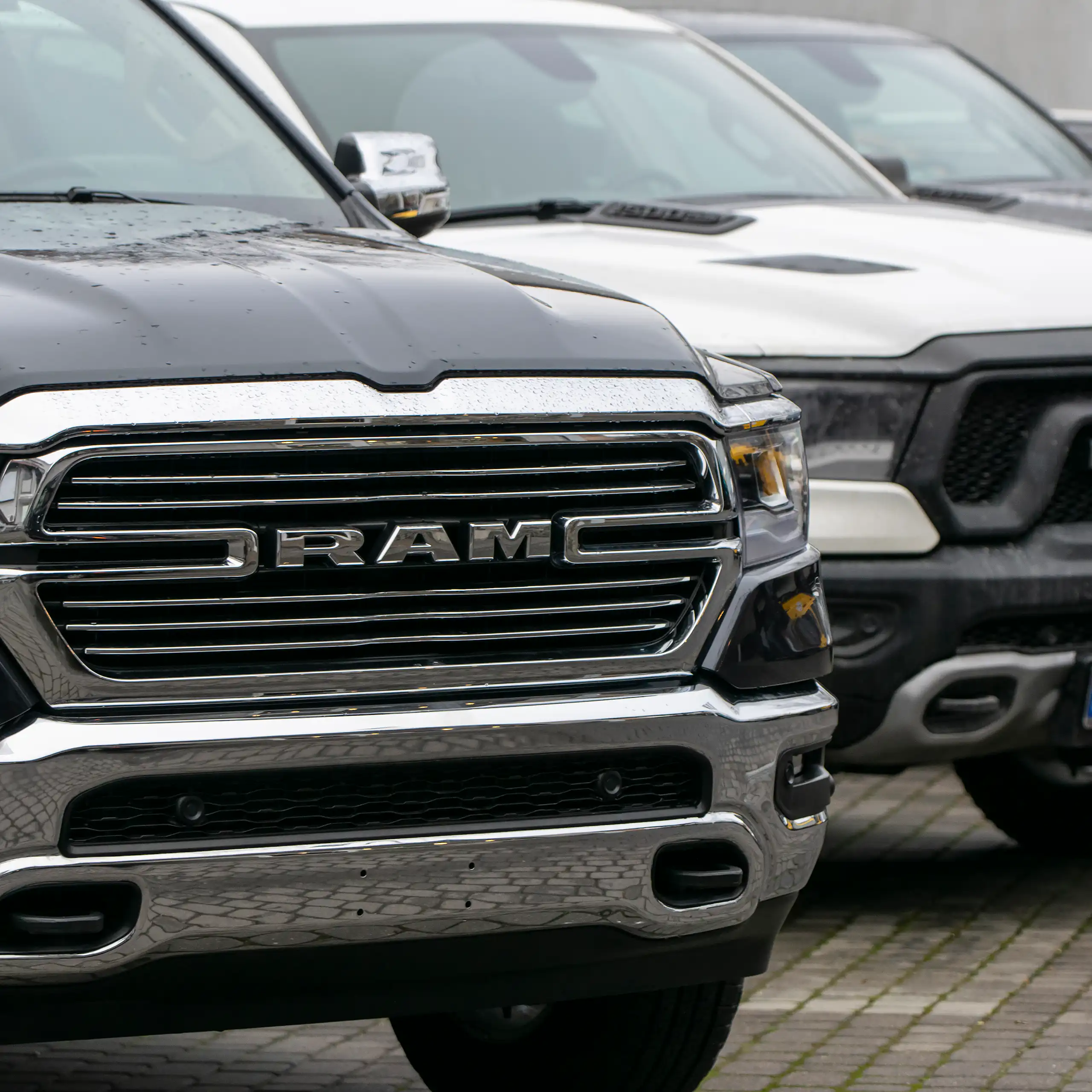 RAM pick-up trucks are seen at a public parking lot.