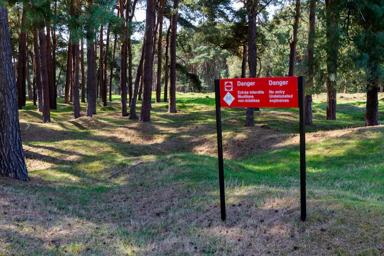 A sign in a forest near the northern French town of Vimy warning passers-by of unexploded bombs from the first world war.