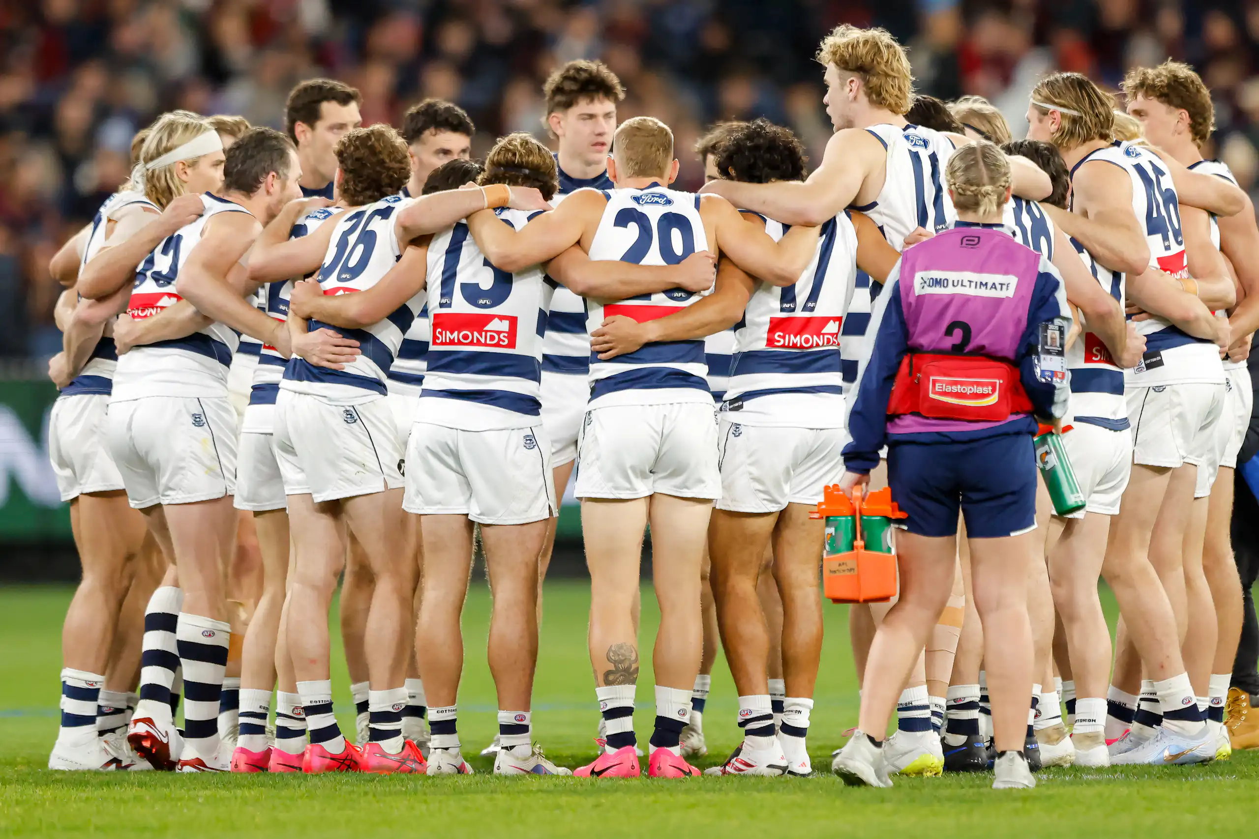 The Geelong players huddle before a 2026 game against Melbourne.