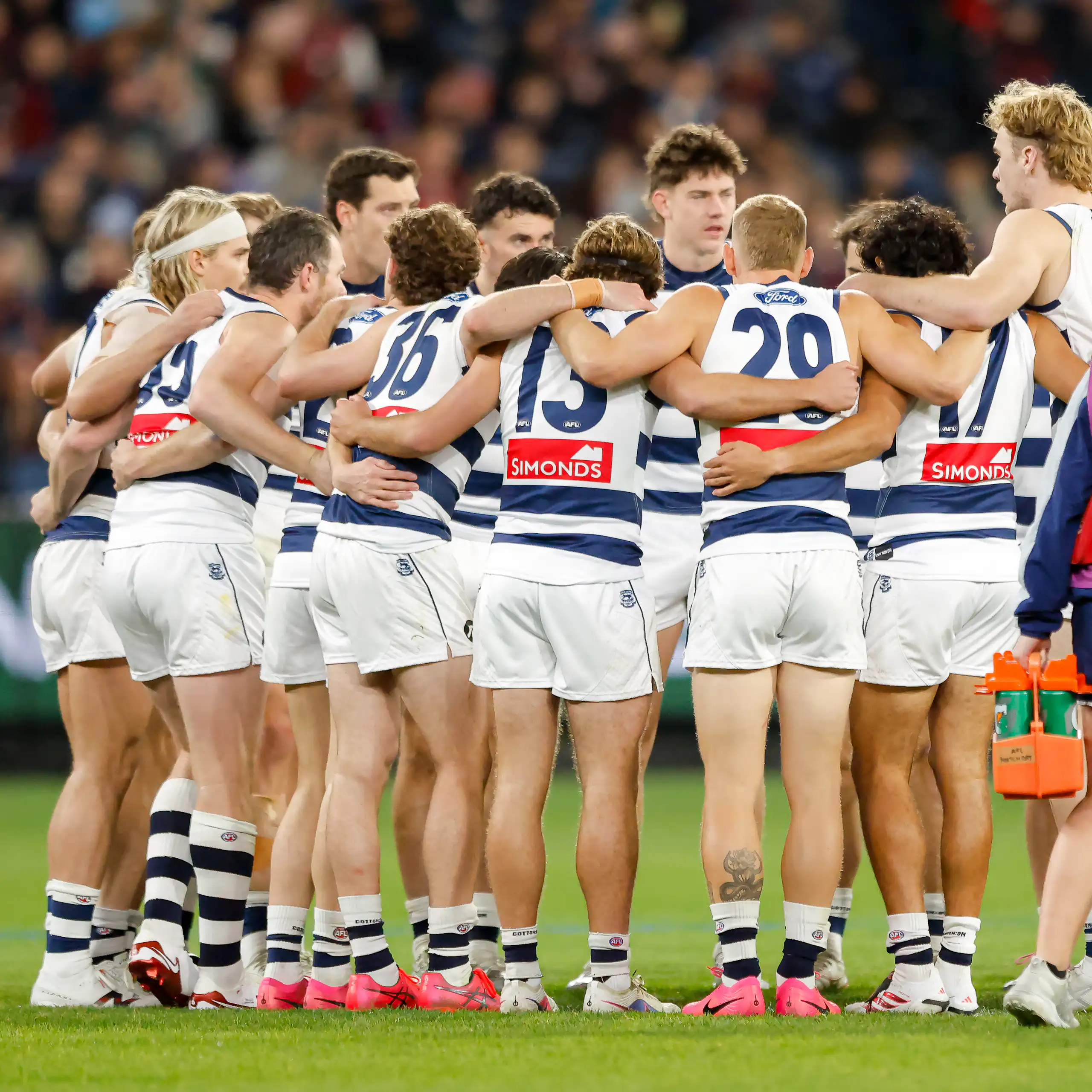 The Geelong players huddle before a 2026 game against Melbourne.