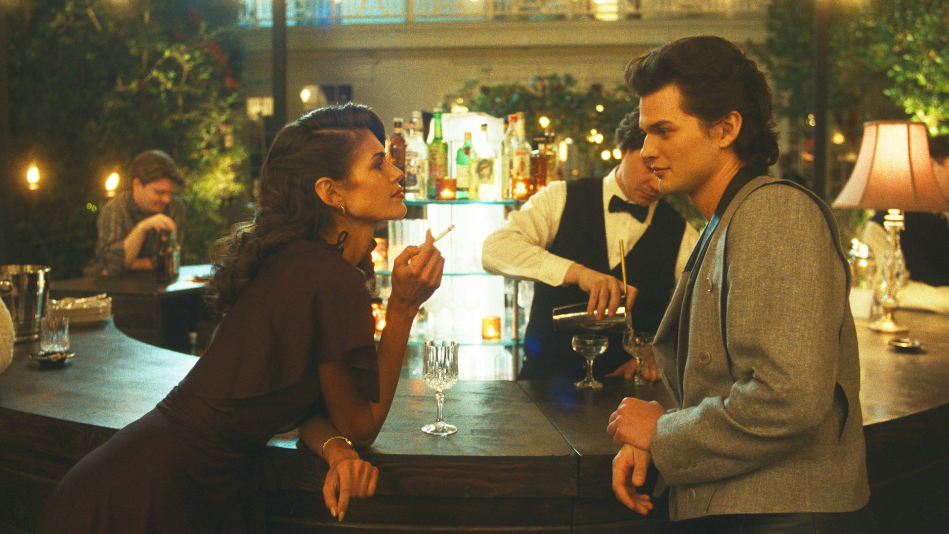 Kaia Gerber and Igby Rigney at a bar.