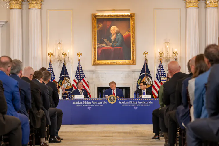 US President Donald Trump seen seated at an American Mining Industry Roundtable in Washington DC.