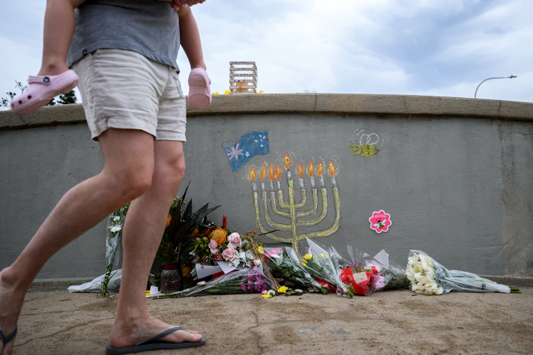 Flowers and mural as a memorial to the Bondi terror attack