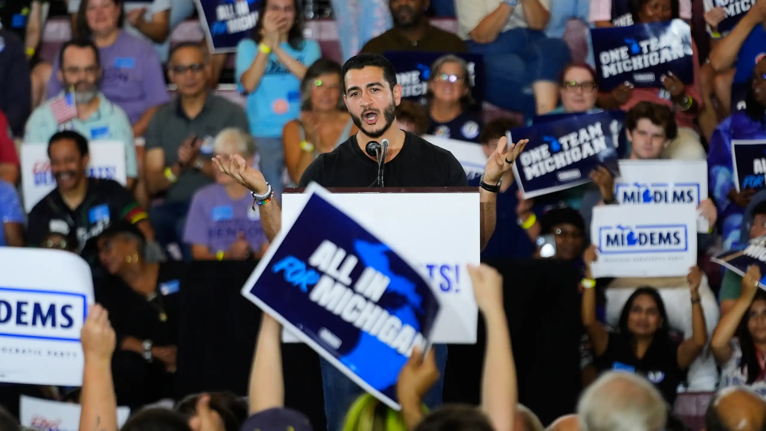 Man speaks to a crowd