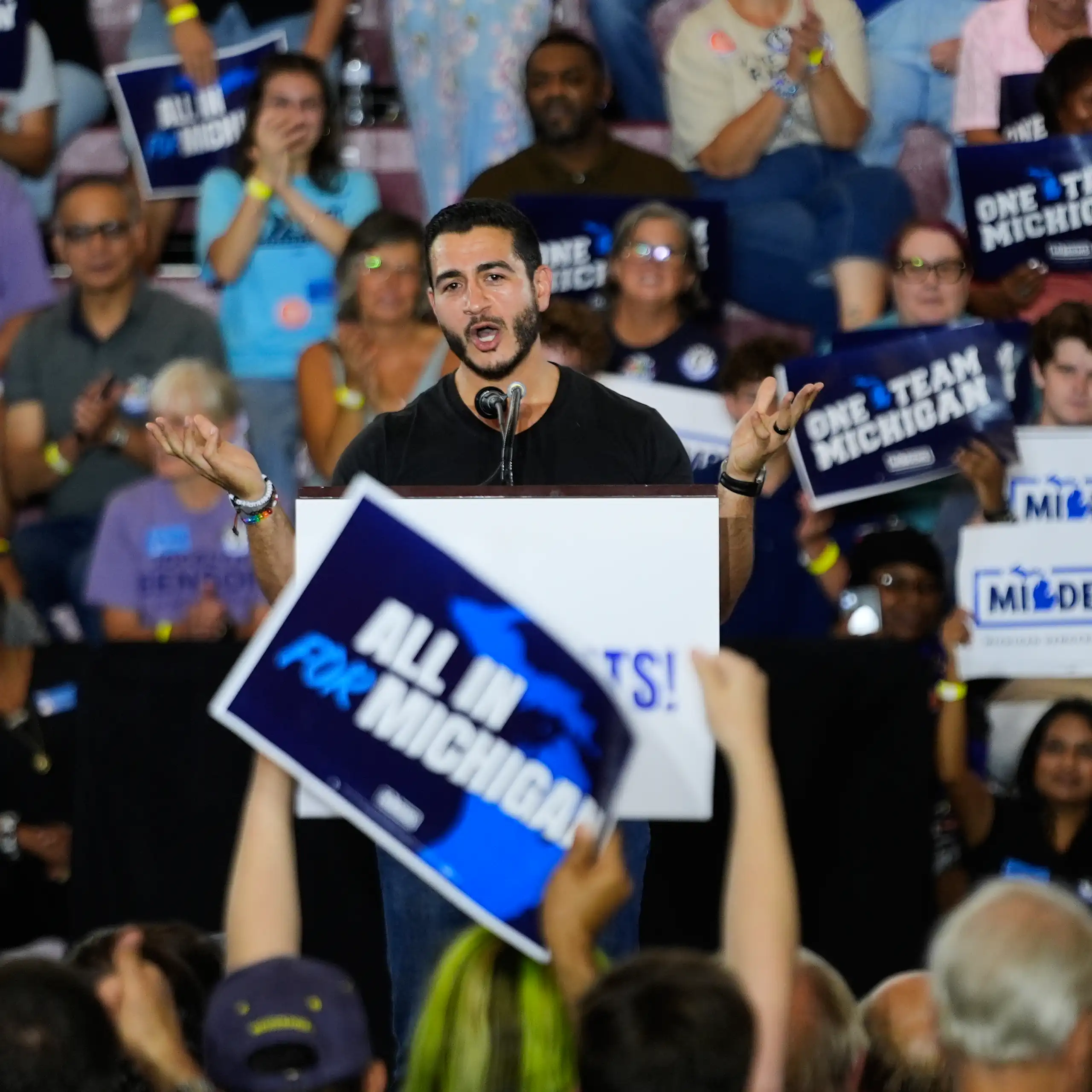 Man speaks to a crowd