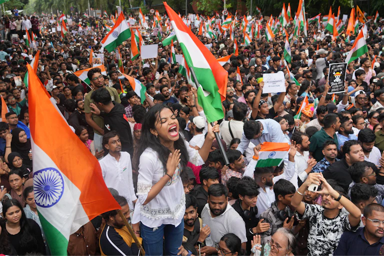 a large crowd of young protesters