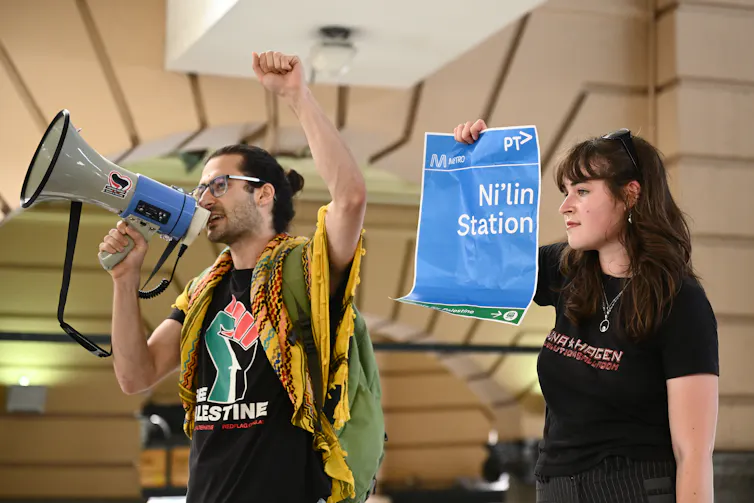Young protesters occupy Flinders Street Station during the School Strike for Palestine.