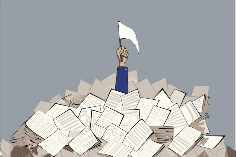 An outstretched arm pokes through a pile of paper, holding a white flag signaling surrender.