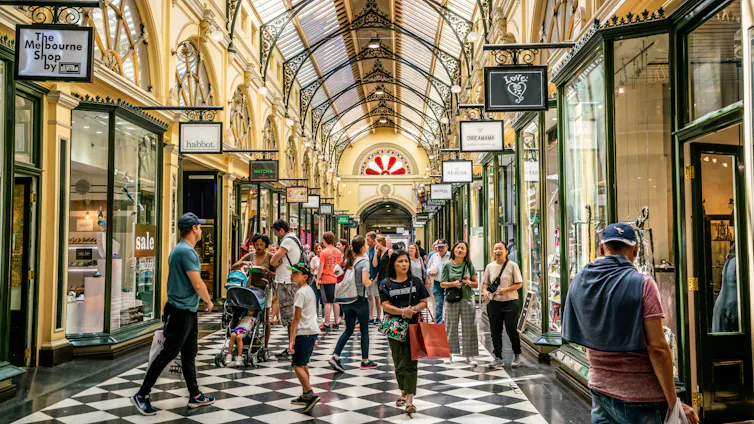 Inside view of the crowded Royal Arcade in Melbourne, Australia.