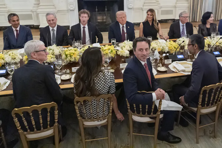 Tech executives including Google founder Sergey Brin (third from left) at a dinner with US President Donald Trump.