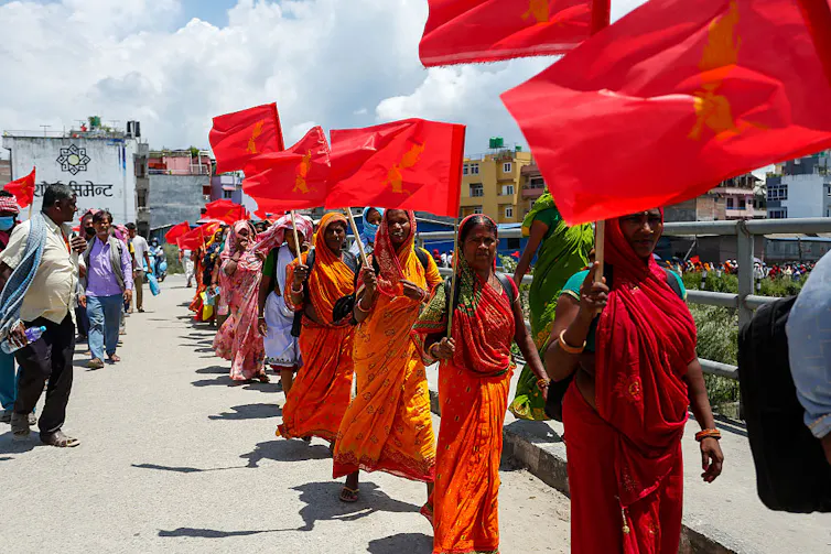 Farmers and workers affected by microfinance March in protest in Kathmandu, Nepal, in July 2026.