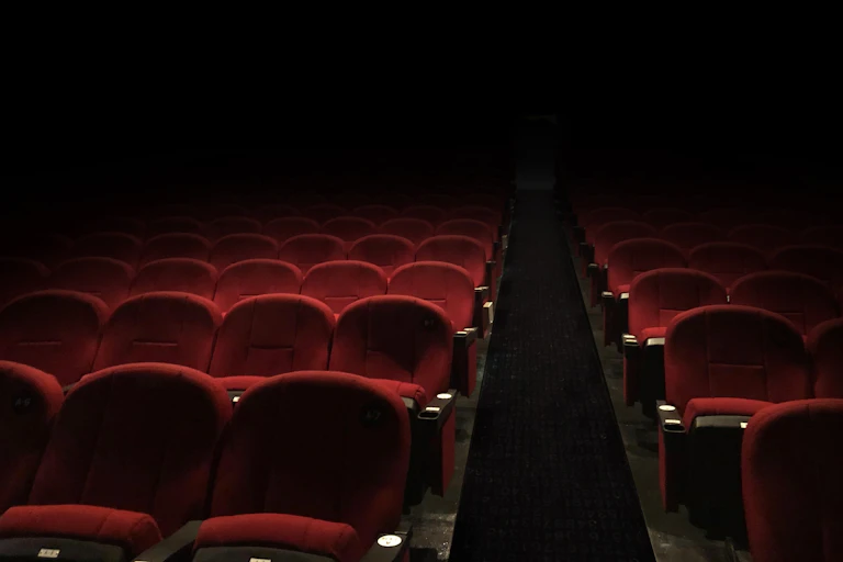Empty red theatre seats