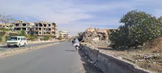The road into a Syrian city.