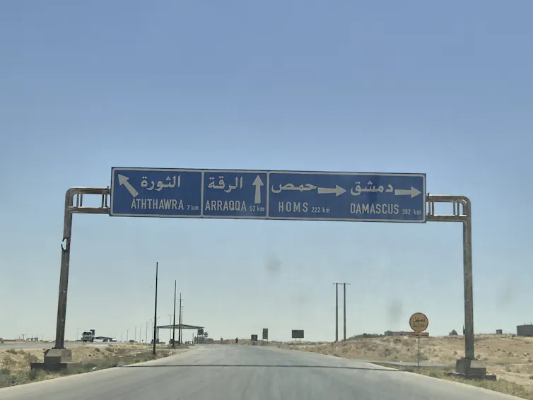 Image of a road and road sign.