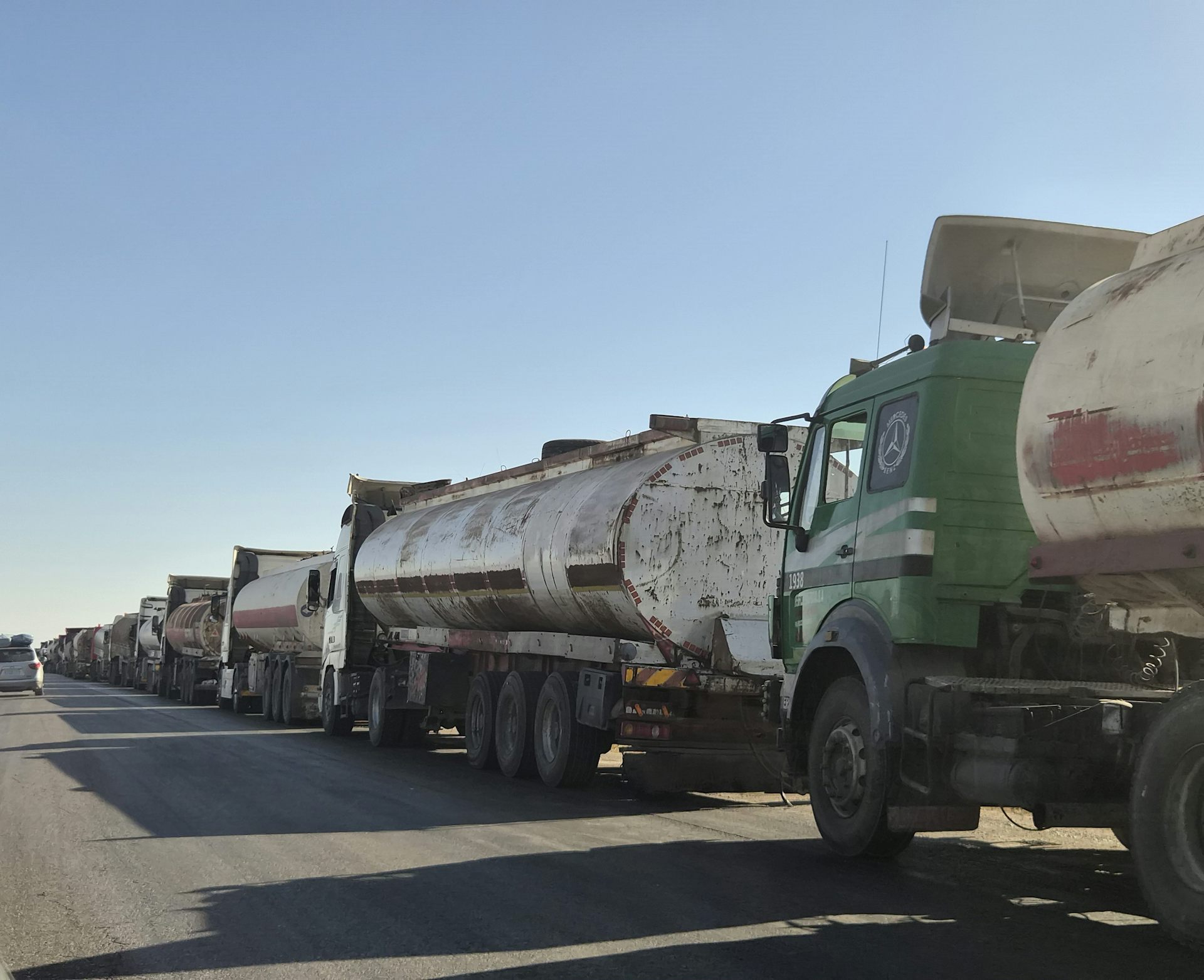 Old trucks lining the road