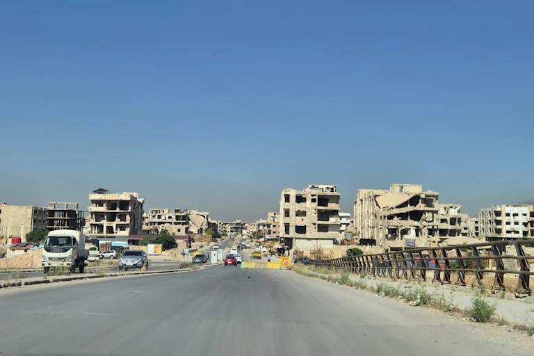 The road into a Syrian city