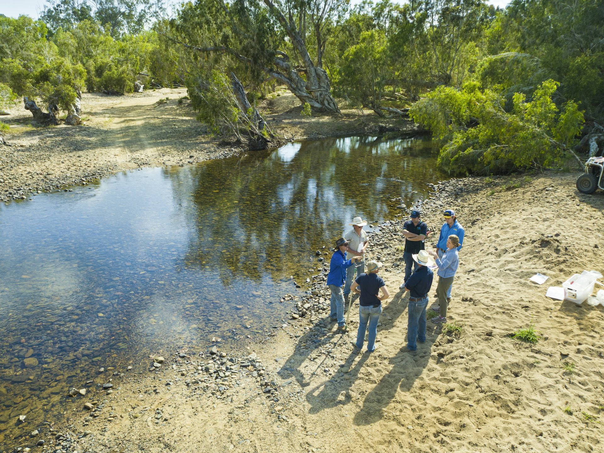 Scientists speaking with graziers about water quality results in the Burdekin catchment