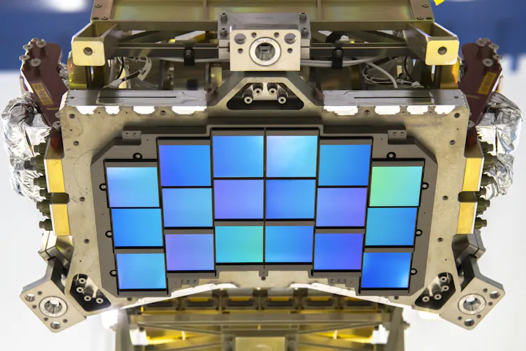 A machine with 18 small iridescent squares, arranged in 3 rows with 6 columns.