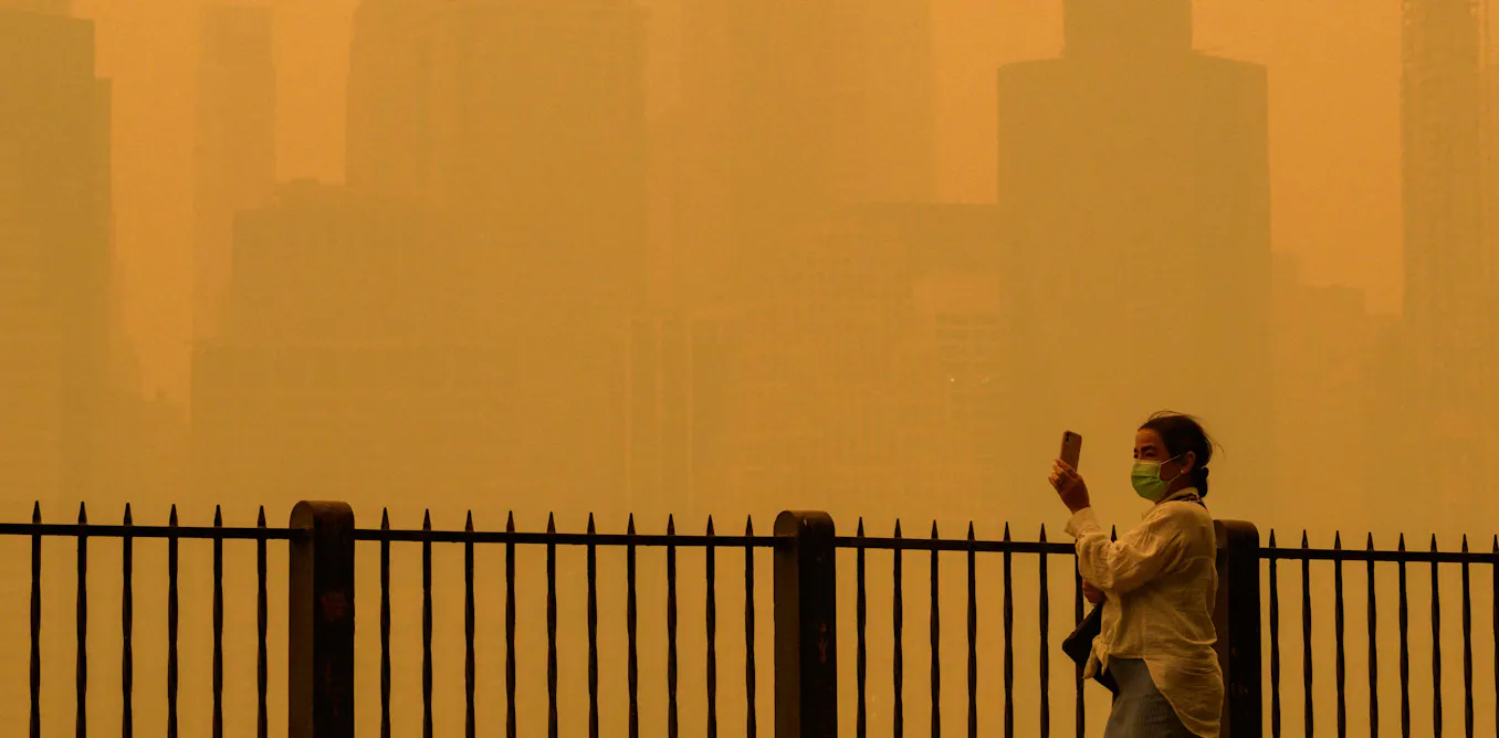 Photograph accompanying Downwind, wildfire smoke loses its color and smell but gains the chemistry of city smog