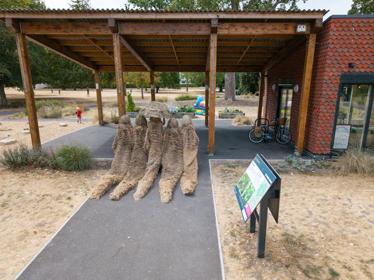Performers enter the park.