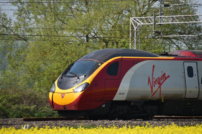 A Virgin train travelling though the countryside