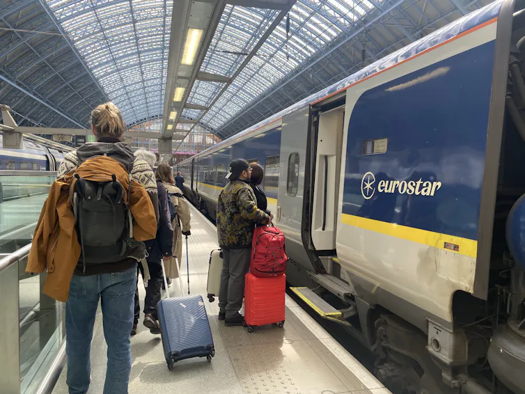 Passengers board a Eurostar train
