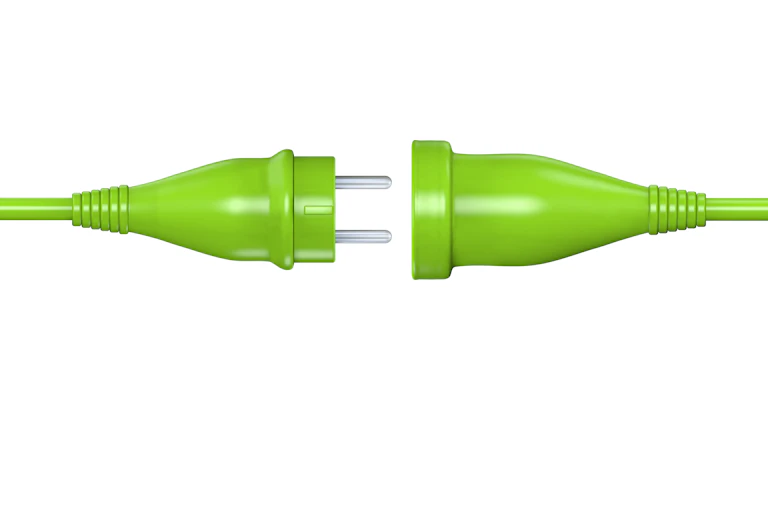 Green electrical cord with plug end ready to insert into socket end