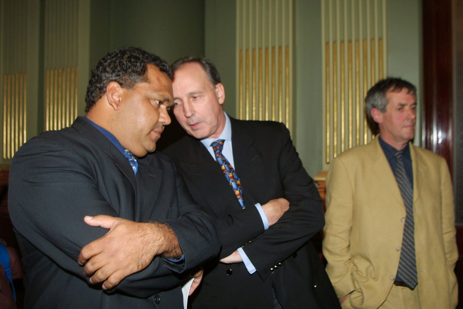 Noel Pearson and Paul Keating speak to each other closely while Don Watson stands apart.