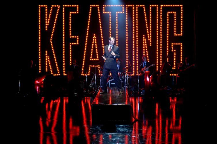 Mike McLeish performs as Paul Keating in Keating: the musical. The words 'KEATING'