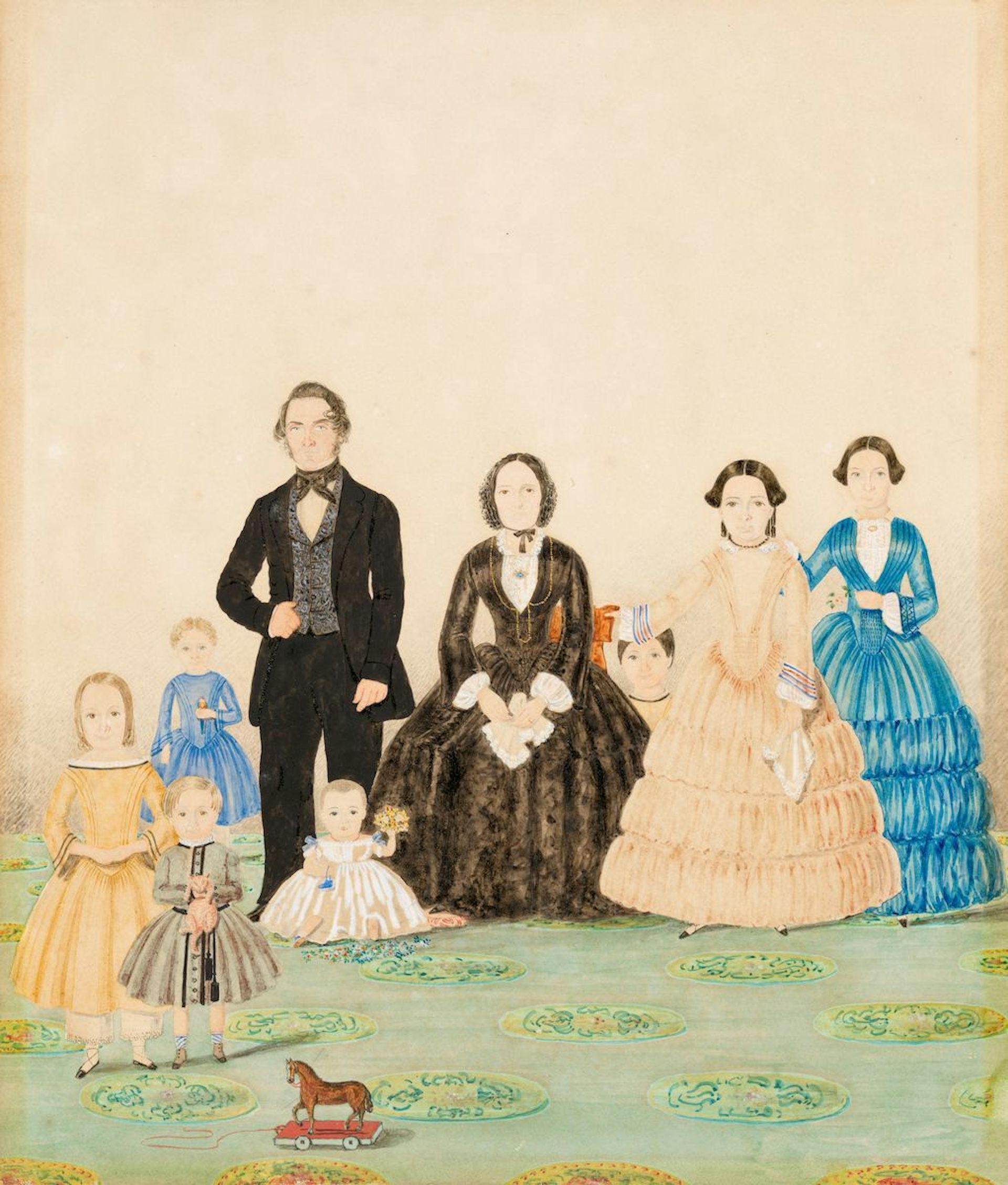 Watercolour painting of a family: two parents and seven kids.