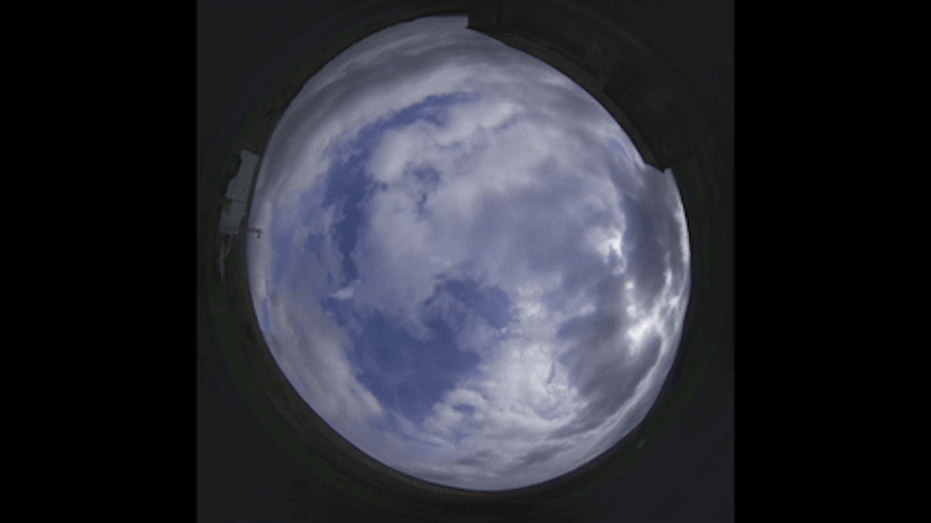 A wide-angle camera captures a timelapse of cumulus clouds.