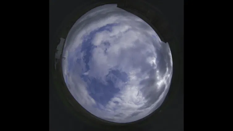 A wide-angle camera captures a timelapse of cumulus clouds.