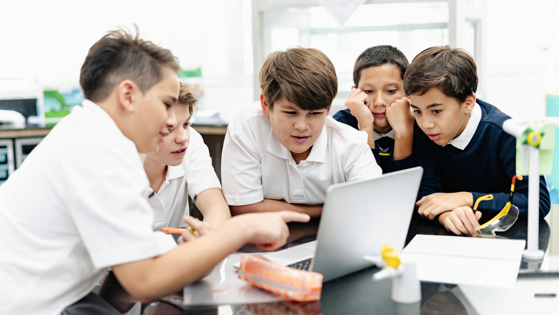 Boys talking in classroom