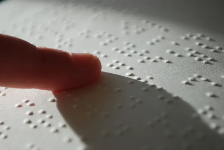 Finger on Braille.