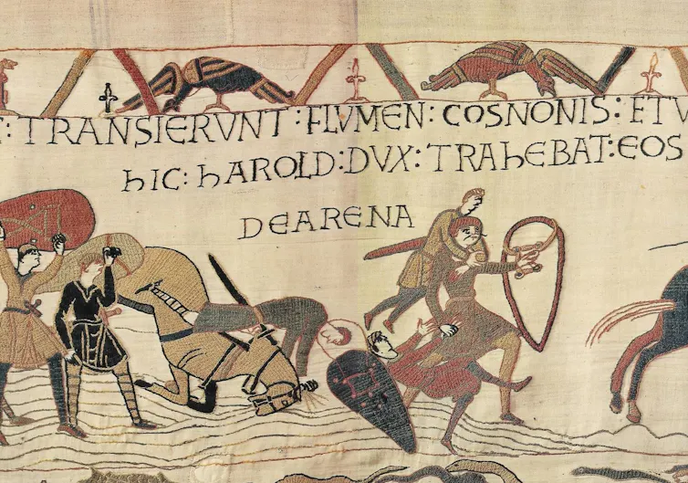 Harold drags Norman soldiers from the quicksand.